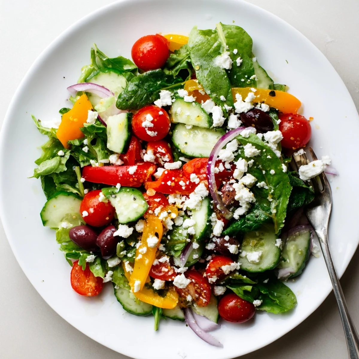Fresh Salad Recipe with crisp greens, juicy tomatoes, and zesty lemon dressing.
