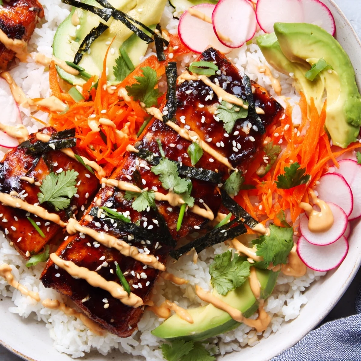 A close-up shows glossy teriyaki glaze on salmon, bright pickled carrots, cucumber, and radishes in a bowl.